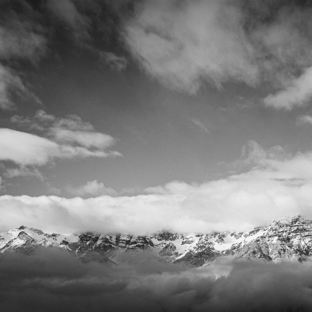 Snowy mountains covered in clouds